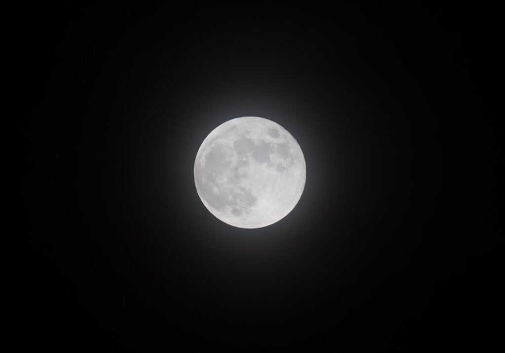 Summer full moon in a clear night sky, illustrating Buck Moon meaning and ritual in July